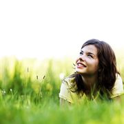 Pretty smiling girl relaxing outdoor