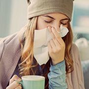 Young woman suffering from cold